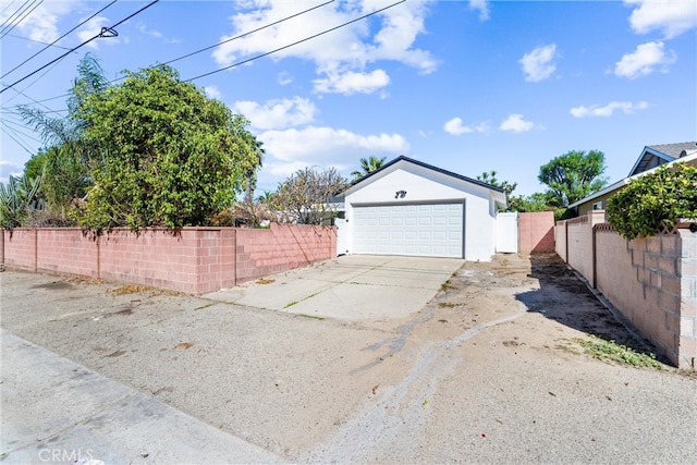 garage featuring fence