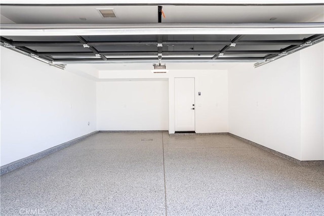 garage with baseboards