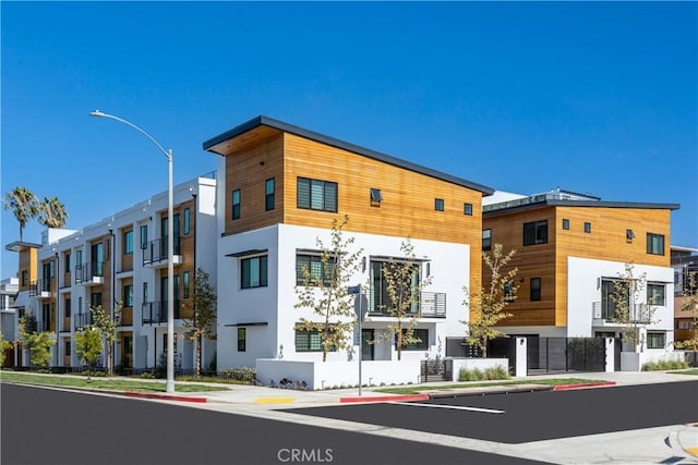 view of building exterior with a residential view