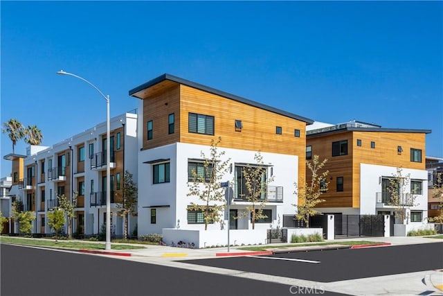 view of building exterior with a residential view