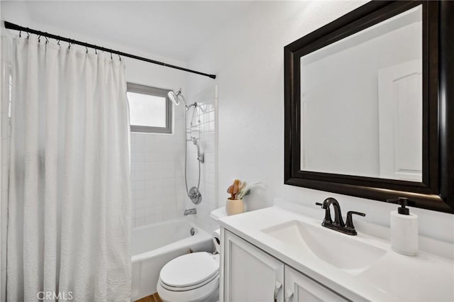 full bath with shower / bath combination with curtain, vanity, and toilet