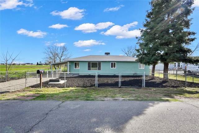 view of front of property with a fenced front yard