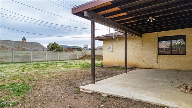 view of yard featuring a patio area and a fenced backyard