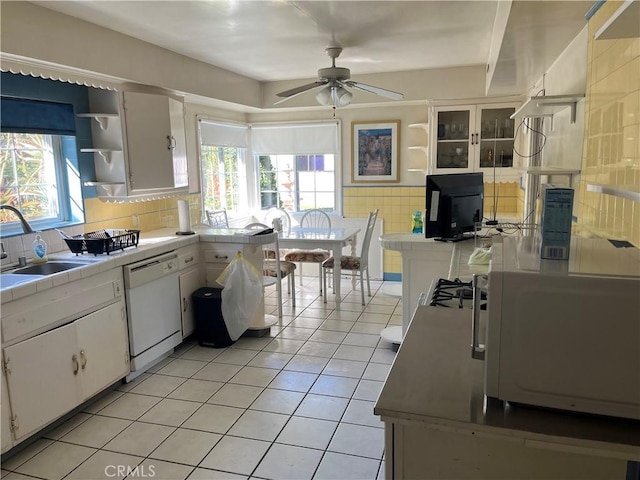 2609 E Cortez St, West Covina, CA 91791 - kitchen with open shelves, white appliances, a sink, and tile countertops