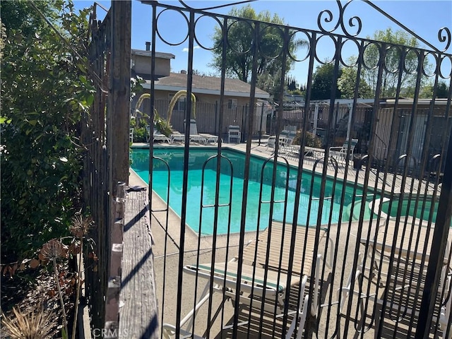 2609 E Cortez St, West Covina, CA 91791 - view of pool featuring fence, a patio area, and a pool with connected hot tub