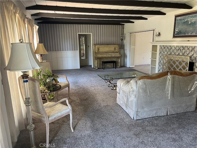 2609 E Cortez St, West Covina, CA 91791 - living area with wallpapered walls, a wainscoted wall, beamed ceiling, a fireplace, and carpet flooring
