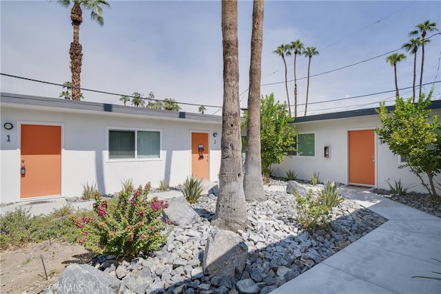 view of front of property featuring stucco siding