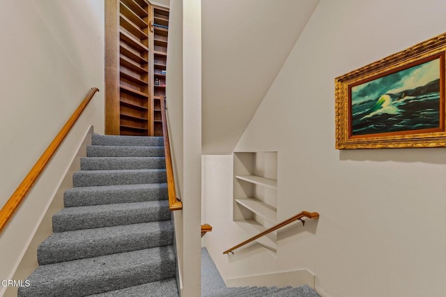 stairway featuring built in features