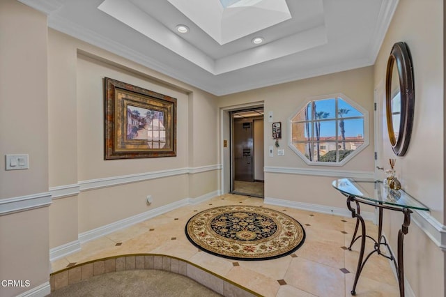 foyer entrance with a raised ceiling, recessed lighting, a skylight, light tile patterned flooring, and baseboards