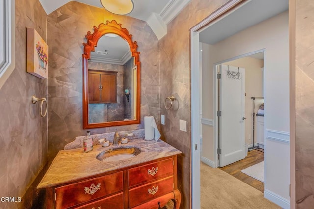 bathroom featuring vanity and crown molding