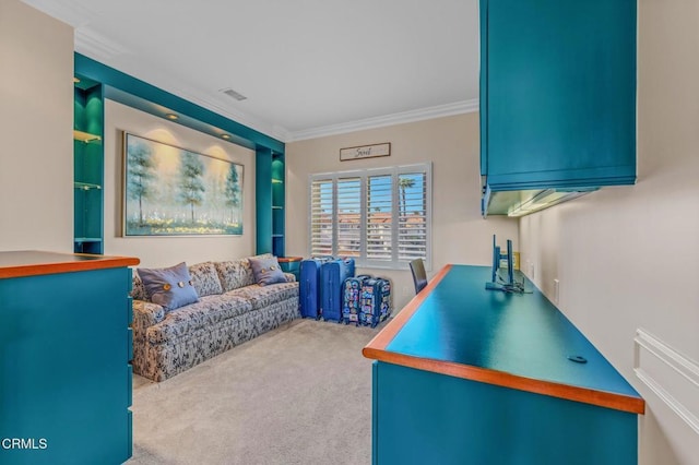 carpeted office space with crown molding and visible vents