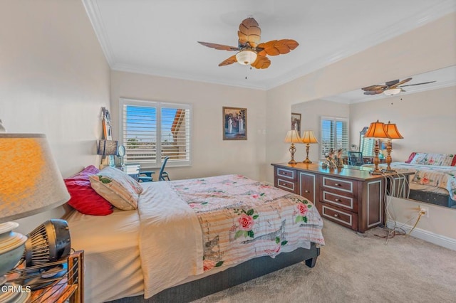 carpeted bedroom featuring baseboards, multiple windows, a ceiling fan, and crown molding