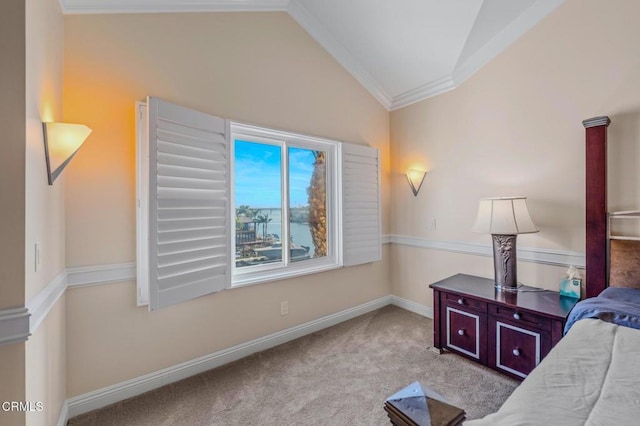 carpeted bedroom with vaulted ceiling, baseboards, and ornamental molding