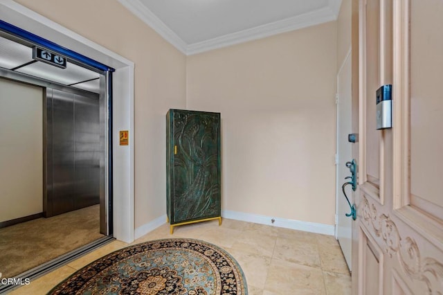 foyer with elevator, baseboards, and ornamental molding