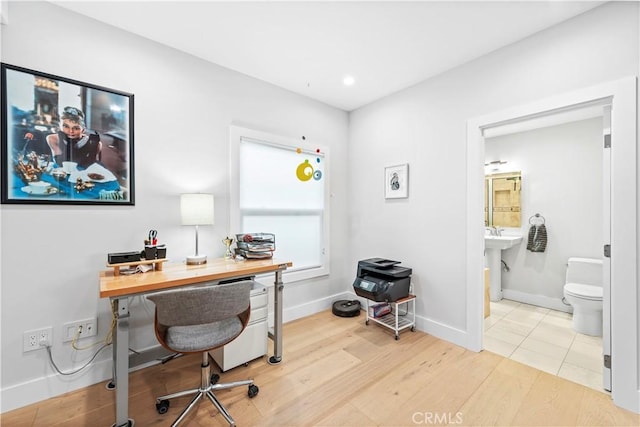 office area featuring recessed lighting, wood finished floors, and baseboards