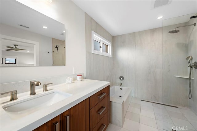 full bathroom featuring visible vents, a tile shower, vanity, tile patterned flooring, and a bath