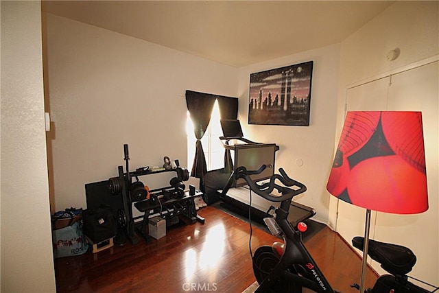 exercise area with wood finished floors