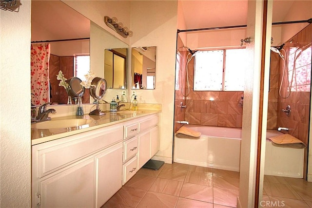 bathroom with a sink, shower / bathtub combination with curtain, and double vanity