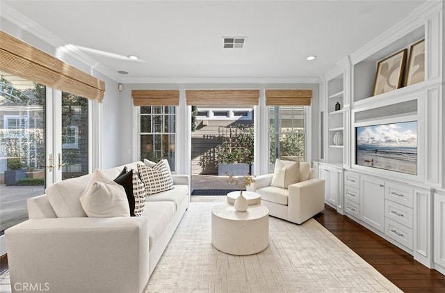 sunroom / solarium featuring visible vents