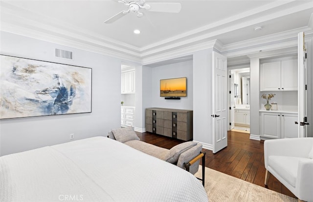 bedroom with ceiling fan, dark wood-style flooring, visible vents, baseboards, and ornamental molding