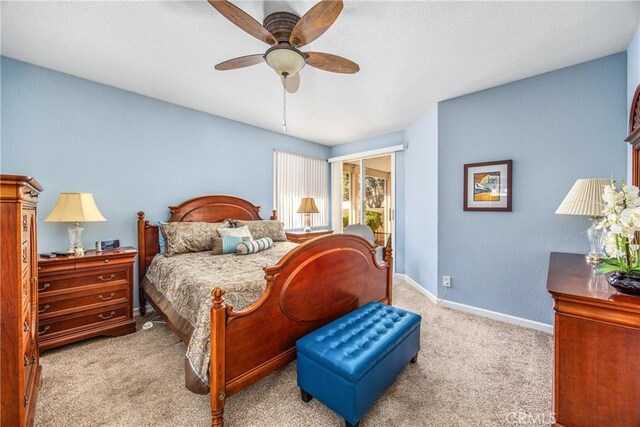 5855 Myrtle Beach Dr, Banning, CA 92220 - carpeted bedroom with a ceiling fan and baseboards
