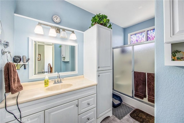 5855 Myrtle Beach Dr, Banning, CA 92220 - bathroom with a shower stall, vanity, and tile patterned flooring