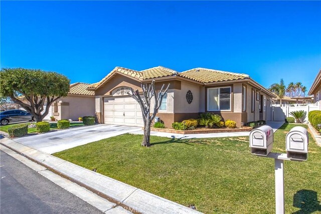 5855 Myrtle Beach Dr, Banning, CA 92220 - mediterranean / spanish home featuring stucco siding, a garage, concrete driveway, and a tile roof