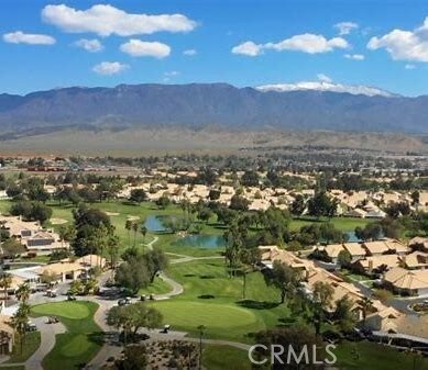 5855 Myrtle Beach Dr, Banning, CA 92220 - aerial view of residential area featuring a golf club and a water and mountain view
