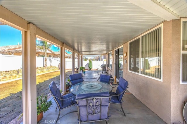 5855 Myrtle Beach Dr, Banning, CA 92220 - fenced backyard with a patio and outdoor dining area