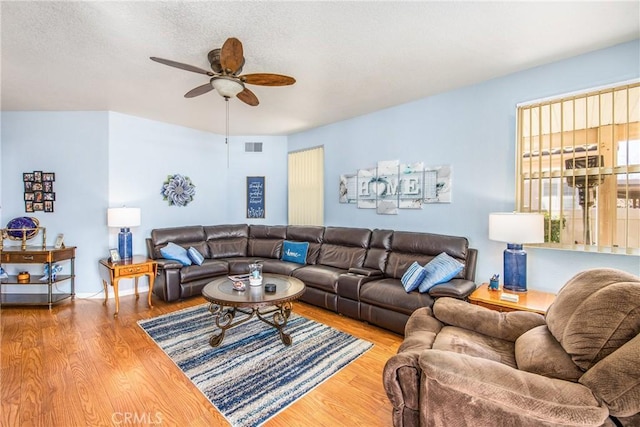5855 Myrtle Beach Dr, Banning, CA 92220 - living room featuring a ceiling fan and wood finished floors