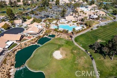 5855 Myrtle Beach Dr, Banning, CA 92220 - aerial overview of property's location with a nearby body of water, nearby suburban area, and a local golf course