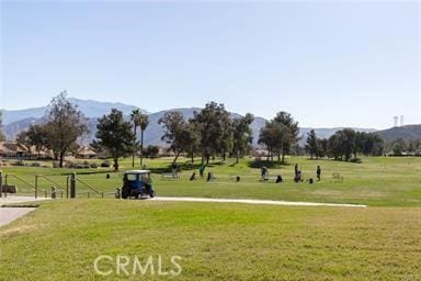 5855 Myrtle Beach Dr, Banning, CA 92220 - view of home's community with a mountain view and a yard