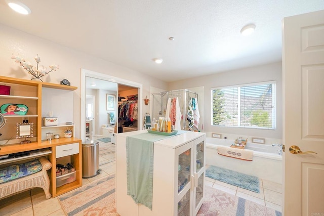 interior space with light tile patterned floors