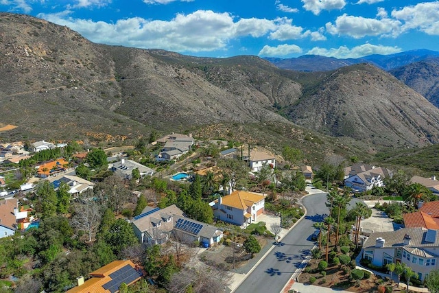 bird's eye view with a residential view and a mountain view