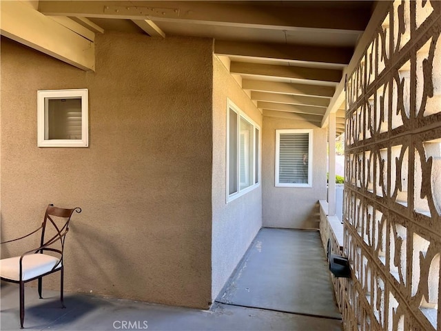 exterior space featuring stucco siding