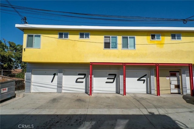 garage featuring driveway