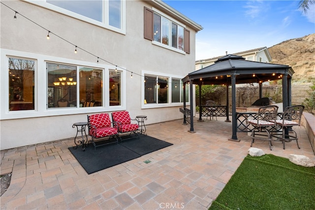 view of patio featuring a gazebo