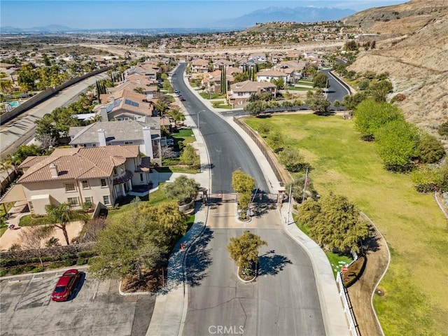 bird's eye view featuring a residential view and a mountain view