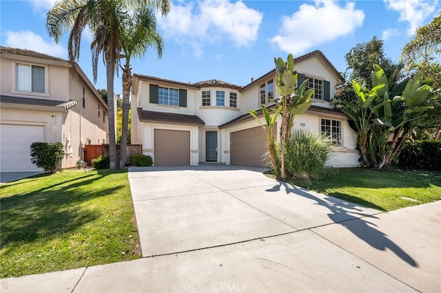 view of front of house featuring stucco siding, a front lawn, concrete driveway, and an attached garage