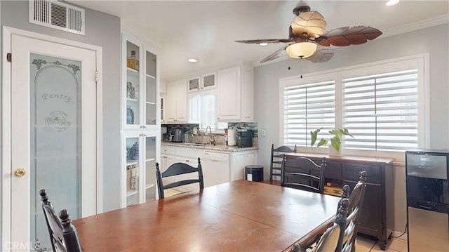 dining room featuring a ceiling fan, recessed lighting, visible vents, and crown molding