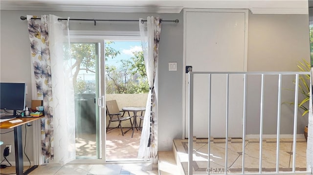 doorway to outside featuring ornamental molding