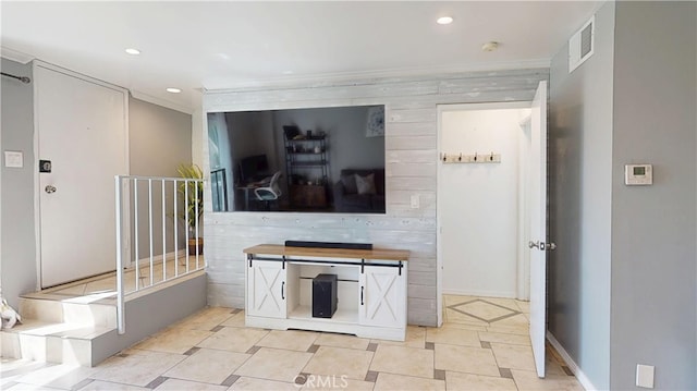 interior space with recessed lighting, visible vents, crown molding, and baseboards