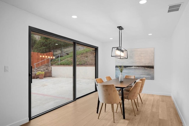 dining area featuring recessed lighting, wood finished floors, visible vents, and baseboards