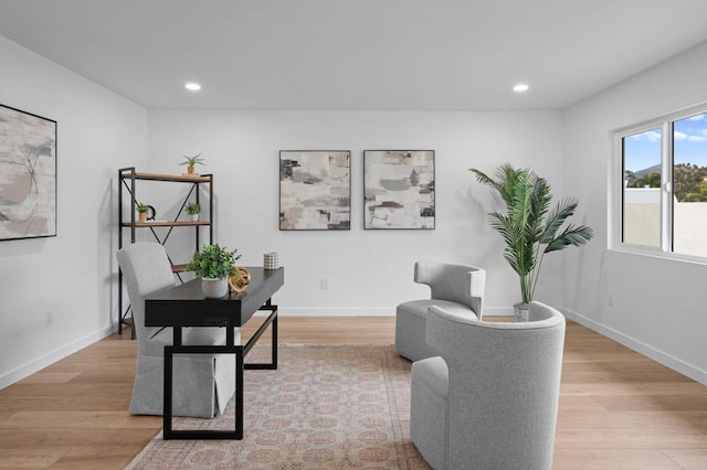 office area featuring recessed lighting, light wood-type flooring, and baseboards