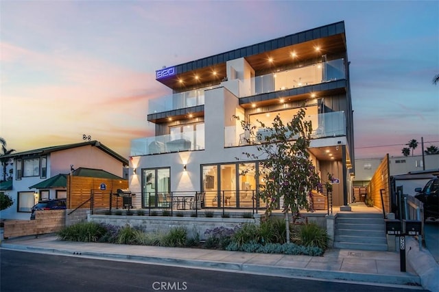 modern home with stucco siding