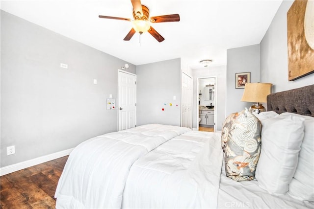 bedroom featuring ceiling fan, wood finished floors, connected bathroom, and baseboards