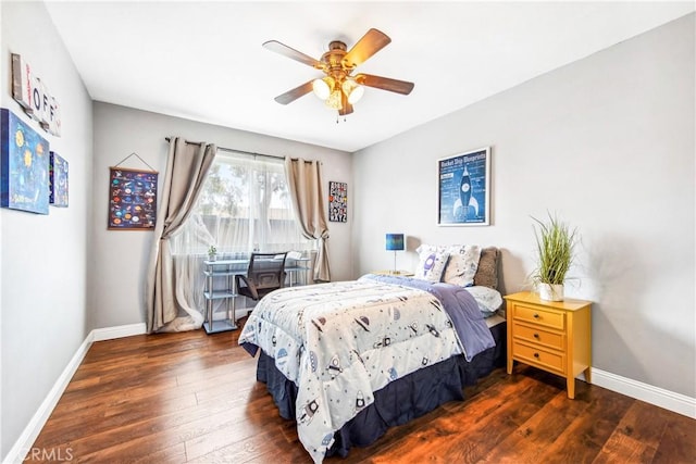 bedroom featuring a ceiling fan, baseboards, and hardwood / wood-style flooring