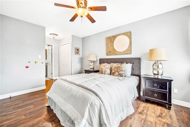 bedroom with ceiling fan, a closet, baseboards, and wood finished floors