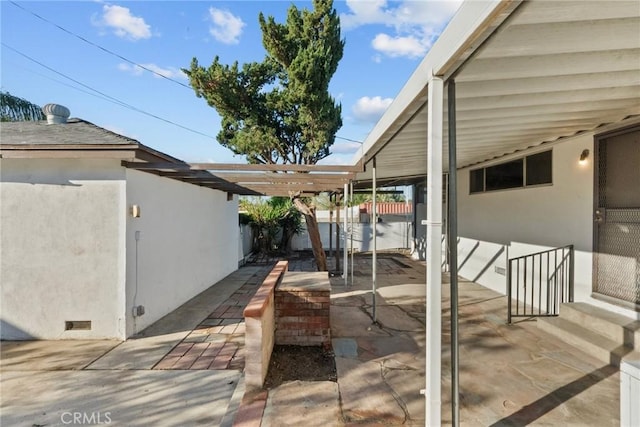 view of patio with fence