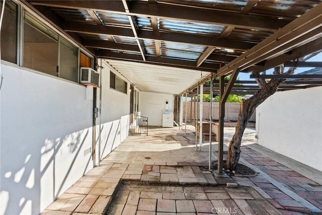 view of patio featuring fence and a pergola